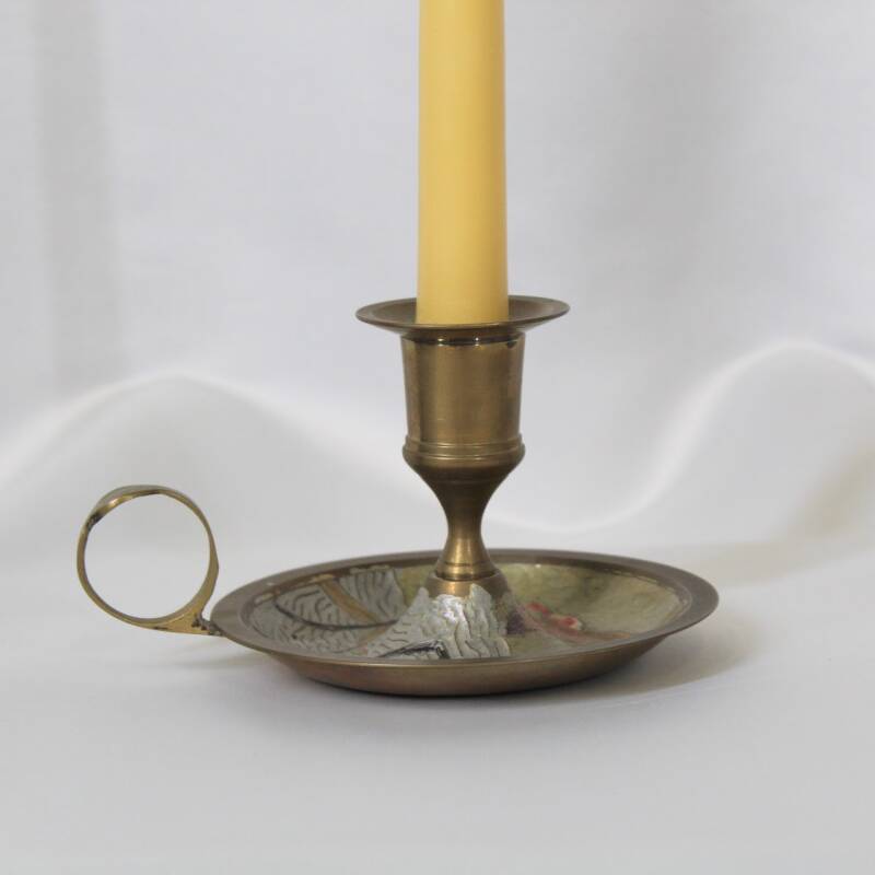 Vintage brass candlestick with drawing