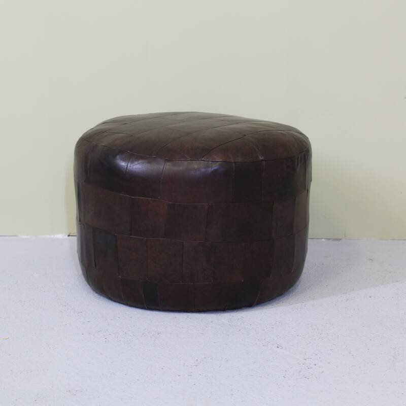 Vintage poef bruin leer