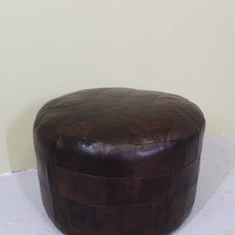 Vintage poef bruin leer