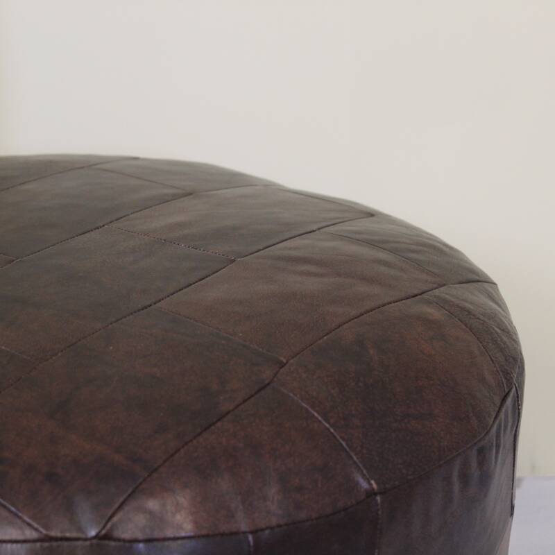 Vintage poef bruin leer