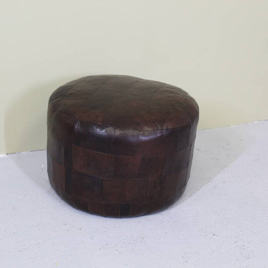 Vintage poef bruin leer
